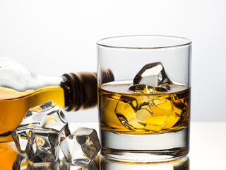 Whisky on the rocks on white background