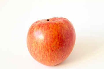 Honeycrisp apple close up on white background.