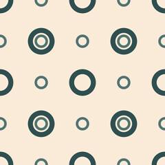 Vector seamless pattern with dark green circles on light beige background. Abstract design in retro style for fabrics, paper and other surfaces.