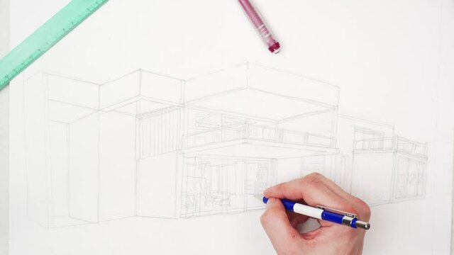 Timelapse of painter's hands who is drawing with pencils a villa sketch on white paper. Home concept