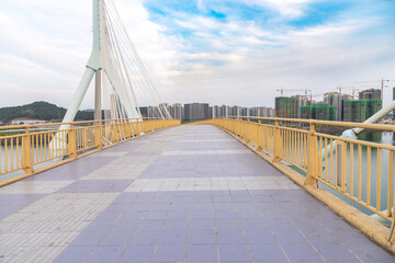 modern sling bridge in the city