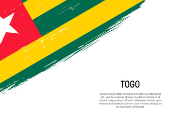 Grunge styled brush stroke background with flag of Togo