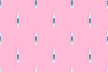 Electronic thermometer seamless pattern. Background on the theme of medicine, health, high temperature.