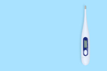 Digital Thermometer. Background on the theme of medicine, health, high temperature.
