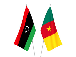 National fabric flags of Libya and Cameroon isolated on white background. 3d rendering illustration.