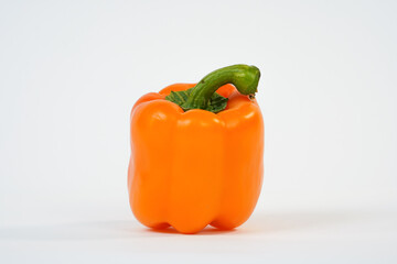  Fresh yellow sweet pepper on white.  Food Concept. Product for sale. Studio photo.  Copy space. 