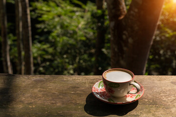 Delicious hot coffee on wooden table. Morning drink. Morning drink for working people.