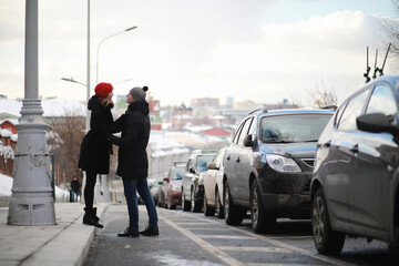 Young couple walking through the winter