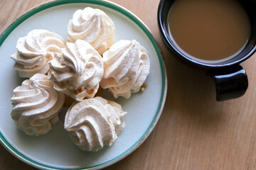 Homemade white meringue cookies.