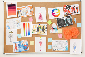 Board with pictures at fashion designer's studio