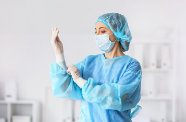 Fototapeta na wymiar Portrait of female surgeon in clinic