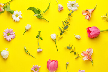 Fototapeta na wymiar Many beautiful spring flowers on color background