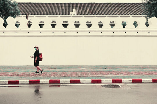 COVID-19, coronavirus in thailand, A new normal tourism protection from the epidemic in 2020. Young Asian tourist woman wearing mask for protection from corona virus.