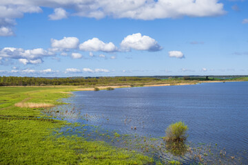View at a beach with a meadow in a beautiful landscape