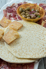 Piadina romagnola with cheese and salami