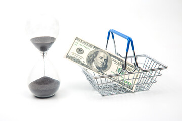 hourglass, dollars and shopping cart for market groceries on white background