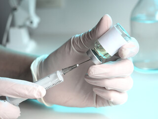 Vaccine medical bottle with syringe, vaccination against covid