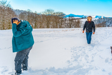 Young people enjoying the Oianleku natural park in the snow in the town of Oiartzun, next to Peñas...