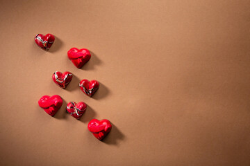 Sweet gift fot Valentine s Day, candy on brown surface