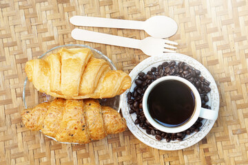 cup of coffee and croissant