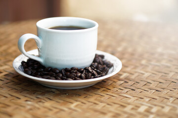 cup of coffee with beans