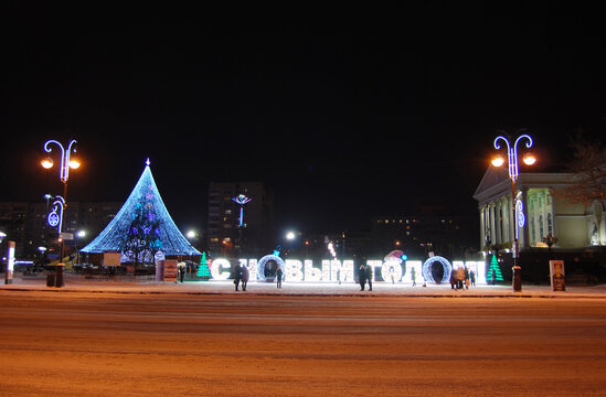 Neon sign New Year 2021 at square of the 400th anniversary of the city of Tyumen, Tyumen, Russia, January 2021