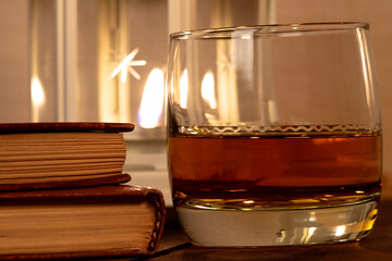 books, glass and whisky