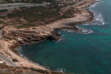 Northern Israeli rocky beach, as seen from the top of the Rosh Hanikra cliffs.