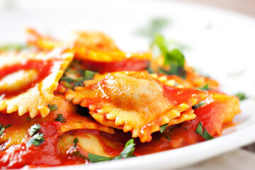 Ravioli with tomato sauce. Typical italian dish.