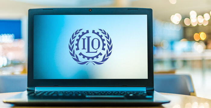 Laptop displaying logo of The International Labour Organization