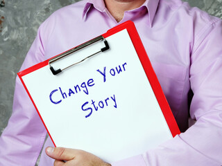 Lifestyle concept about Change Your Story with phrase on the piece of paper.