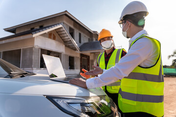 Engineer recommend house construction to supervisor supervisors at construction site. House builder...
