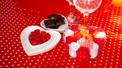 Obraz na płótnie Canvas Festive dinner. Date. Red background for Valentines day. Love dinner concept