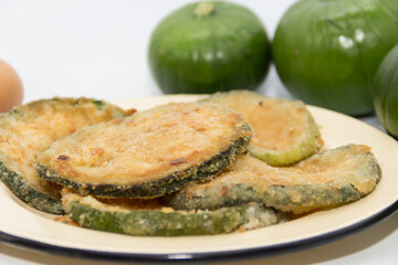 Trunk zucchini in baked or fried milanesas, Argentine cuisine