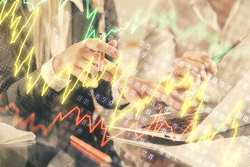 Double exposure of man and woman working together and forex chart hologram. Business concept. Computer background.