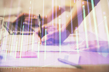 Multi exposure of woman hands typing on computer and financial chart hologram drawing. Stock market analysis concept.