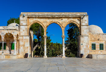 Fototapeta na wymiar Temple Mount with gateway arches leading to Dome of the Rock Islamic monument shrine in Jerusalem Old City, Israel