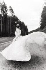 the bride is spinning in a white dress