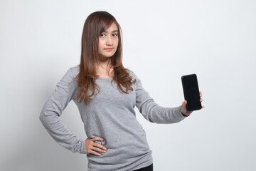Naklejka premium Young Asian woman with mobile phone.