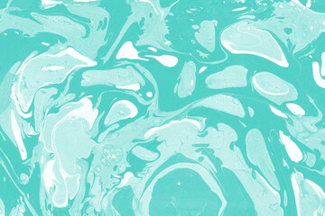 Aqua marble ink texture on watercolor paper background. Marble stone image. Bath bomb effect. Psychedelic biomorphic art.