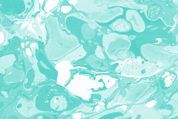 Aqua marble ink texture on watercolor paper background. Marble stone image. Bath bomb effect. Psychedelic biomorphic art.