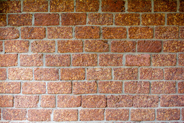 The brown wall to stone make and concrete are design by color and square shape an outstanding.