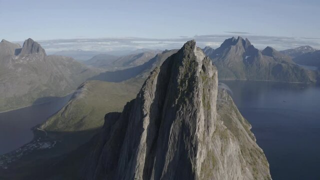 Impressive cliff taken from above during the sunset, Segla mountain Senja, Norway.