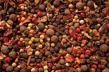 mix different spices and peppers on a wooden board. close-up, macro, pattern