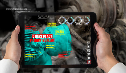 Engineer use augmented reality software in smart factory production line with automated application...