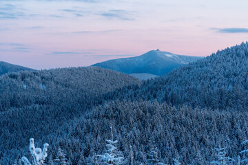 The highest mountain in the Beskydy - Lysa hora (Bald mountain) in winter during sunrise czech