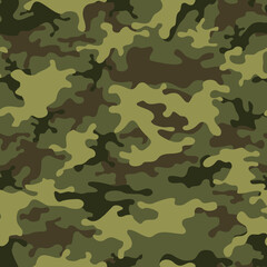Fototapeta premium Camouflage green seamless pattern. Abstract background of green and dark spots on a green background. Camo for hunting and fishing. Print on fabric on clothes. Vector illustration