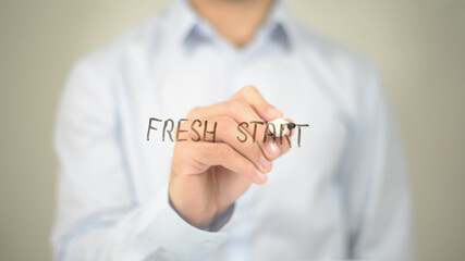 Fresh Start , Man writing on transparent screen