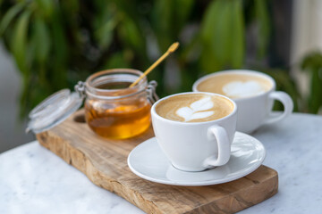 cup of tea with cinnamon sticks coffee latte