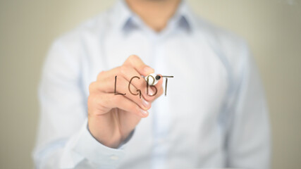 LGBT , Man writing on transparent screen